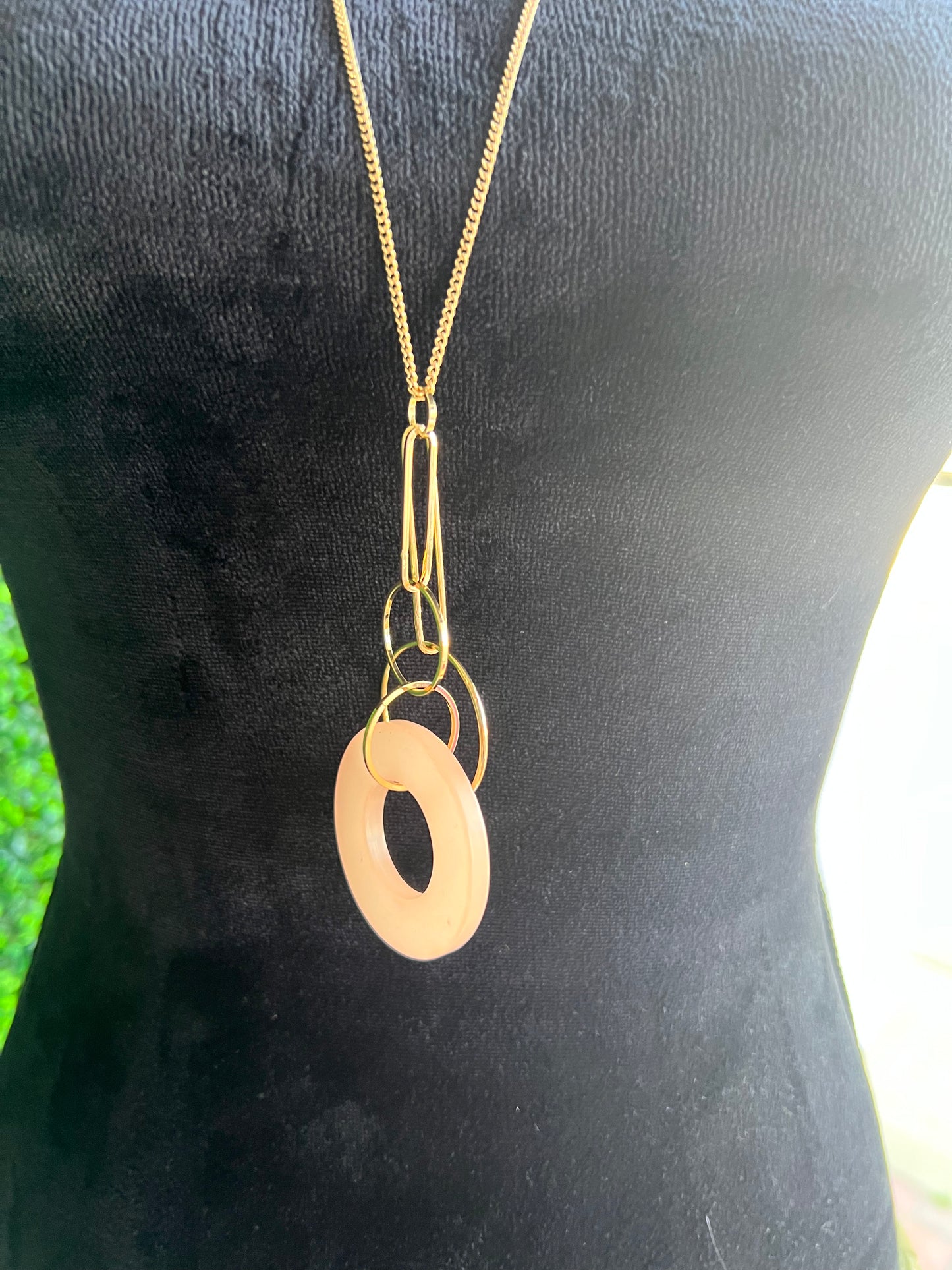 You spin me round pendant